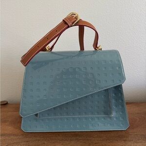 ARCADIA Patent Blue Crossbody bag